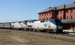 AMTK 152 & 197 lead train P092-13 into the station